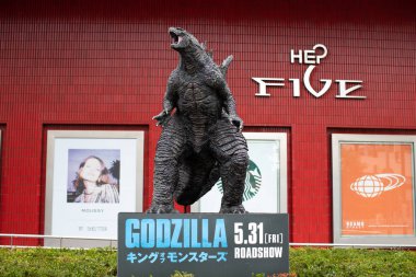 Statue of Godzilla near HEP Five in Osaka, Japan clipart