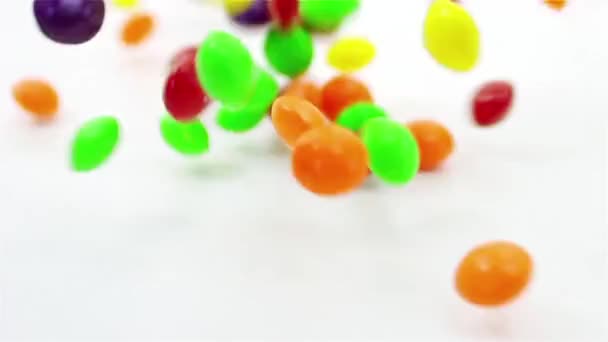 Candy Dropping and Tumbling Seamless Loop — Stock Video