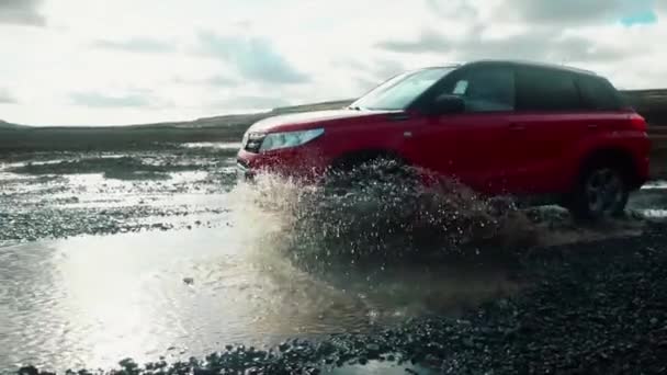 Car Driving Through Puddle In Slow Motion — Stock Video