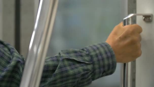 Man Holding Hand Rail on Train — Stock Video