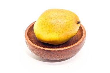 Makro sarı taze olgun organik armut kahverengi ahşap Kupası