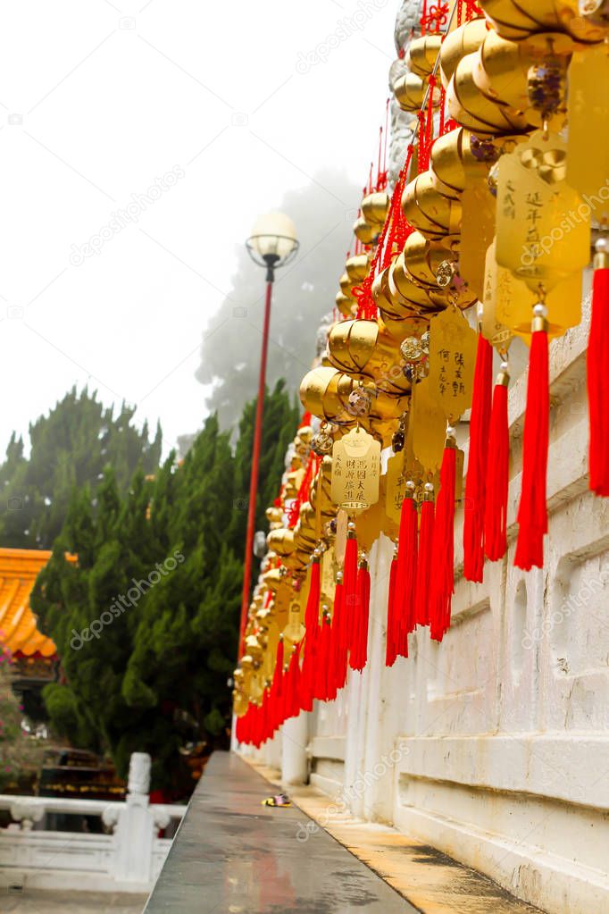 Closeup of golden ball hanging in wenwu temple