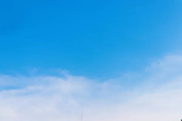 wallpaper of blue sky with clouds Background
