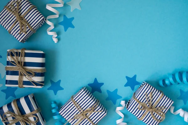 Süslü hediye kutuları, konfeti ve yılanbalığının şenlikli köşesi.