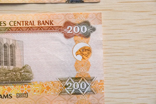 Närbild Uae 200 Dirhams Sedlar Valuta Ljusa Träbord Från Hög — Stockfoto