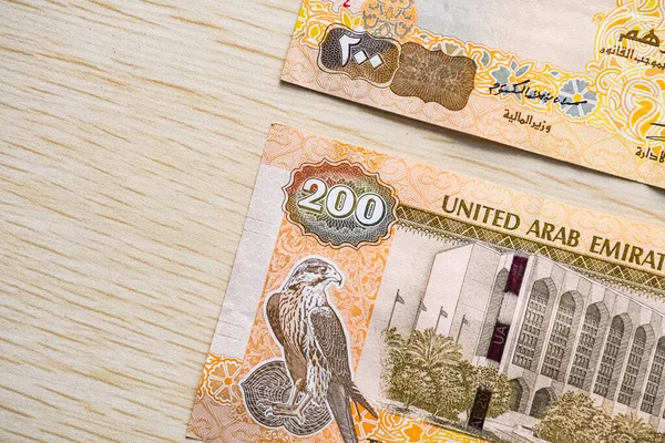 Närbild Uae 200 Dirhams Sedlar Valuta Ljusa Träbord Från Hög — Stockfoto