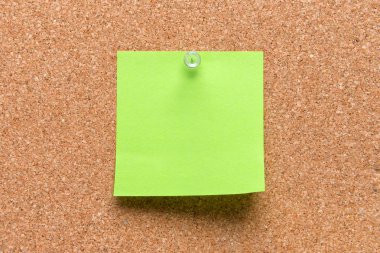 boş kare yeşil yaprak kahverengi mantar mektubunda tutturulmuş.