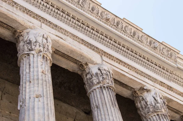 Horizontal view of Roman column details on Pantheon of Agrippa facade, on a summer sunny day, Rome, Italy