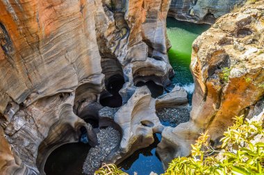 Rock formation in Bourke's Luck Potholes in Blyde canyon reserve clipart