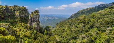 The Pinnacle rock a very tall quartzite rock in Sabie Graskop Mpumalanga South Africa clipart