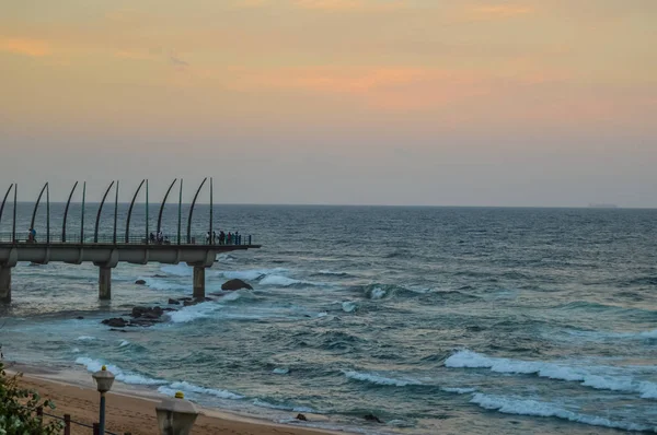 Beautiful Umhlanga Promenade Pier a whalebone made pier in Kwazulu Natal Durban North South Africa during sunset — Stock Photo, Image