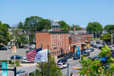 SALEM, MA, USA - JUL. 25, 2019: Historic commercial buildings on Derby Street at Union Street in historic town Salem, Massachusetts MA, USA. clipart