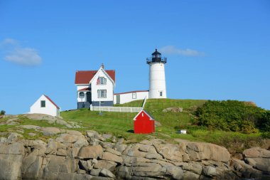 Cape Neddick Lighthouse (Nubble Lighthouse) at Old York Village, Maine ME, USA. clipart