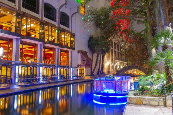 San Antonio River Walk and boat with light near La Villita in downtown San Antonio, Texas, TX, USA.