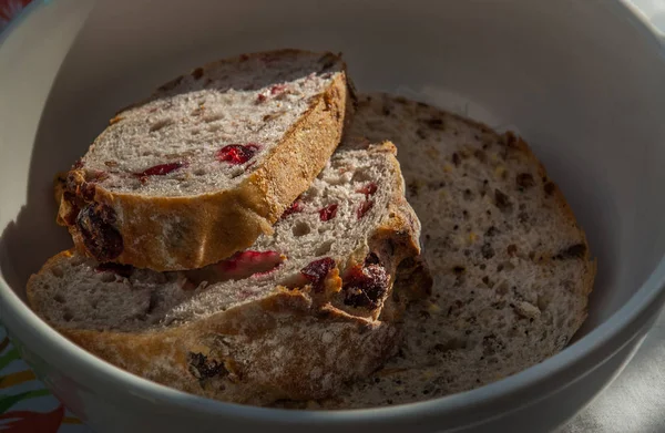 Cranberry walnut bread in a white bowl — Stock Photo, Image