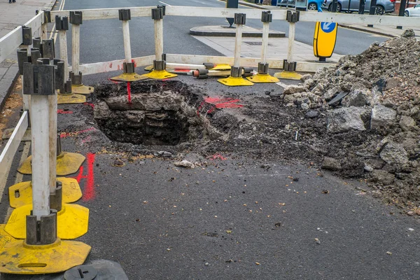 Área do bloco para reparar e melhorar a superfície da estrada . — Fotografia de Stock