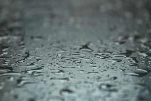Close up raining water drop on the stainless steel, surface afte — Stock Photo, Image