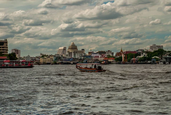 The passenger ferryboat on the Chao Phraya River showing the sev — Stock Photo, Image