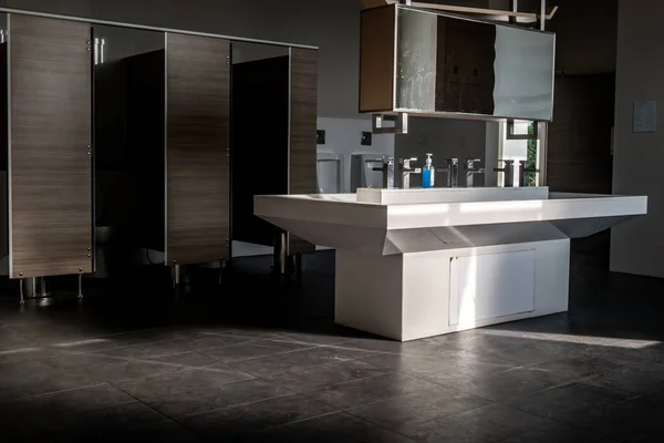 Bathroom interior sink with modern design. Interior of bathroom with washbasin and faucet.