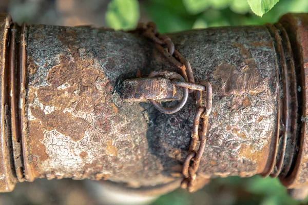 Close-up of Rusty iron pipe. Old rusty metal pipe. Selective focus.
