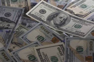 Bir yığın Amerikan doları. Banknotlar arka plan. Zenginlik ve tasarruf