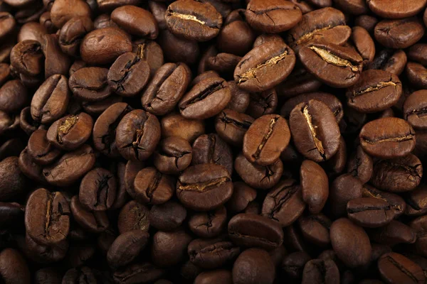 Kavrulmuş Kahve Çekirdekleri Arka Plan Yığını — Stok fotoğraf
