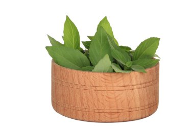 Yaprakları ile ahşap kase closeup 