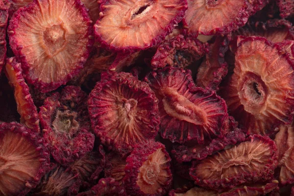 Closeup of dry strawberries pattern, food background