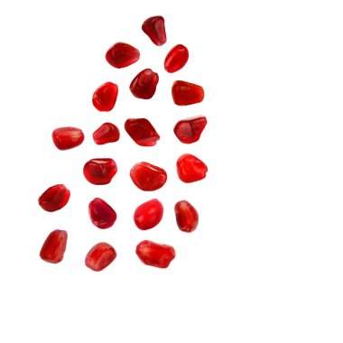 Beyaz arkaplanda izole edilmiş nar tohumları