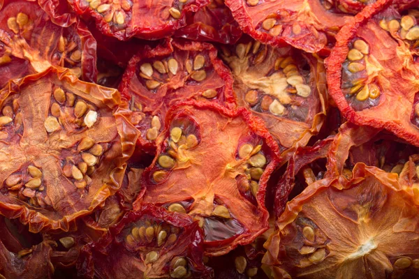 Closeup of dry tomatoes pattern, food background