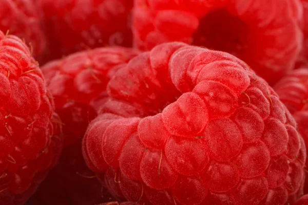 Closeup of raspberries pattern, food background