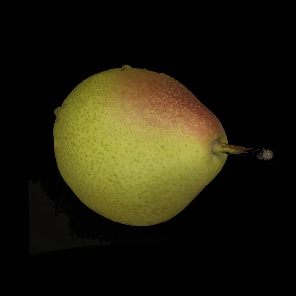 Pear fruit on black background