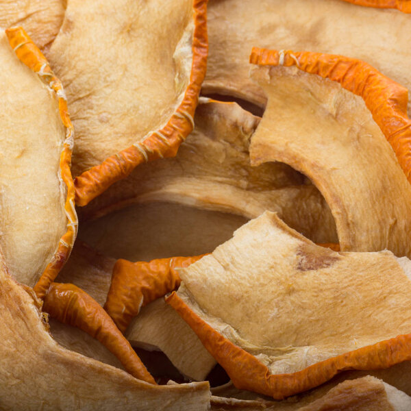 Closeup of pile of dried fruits, food background 