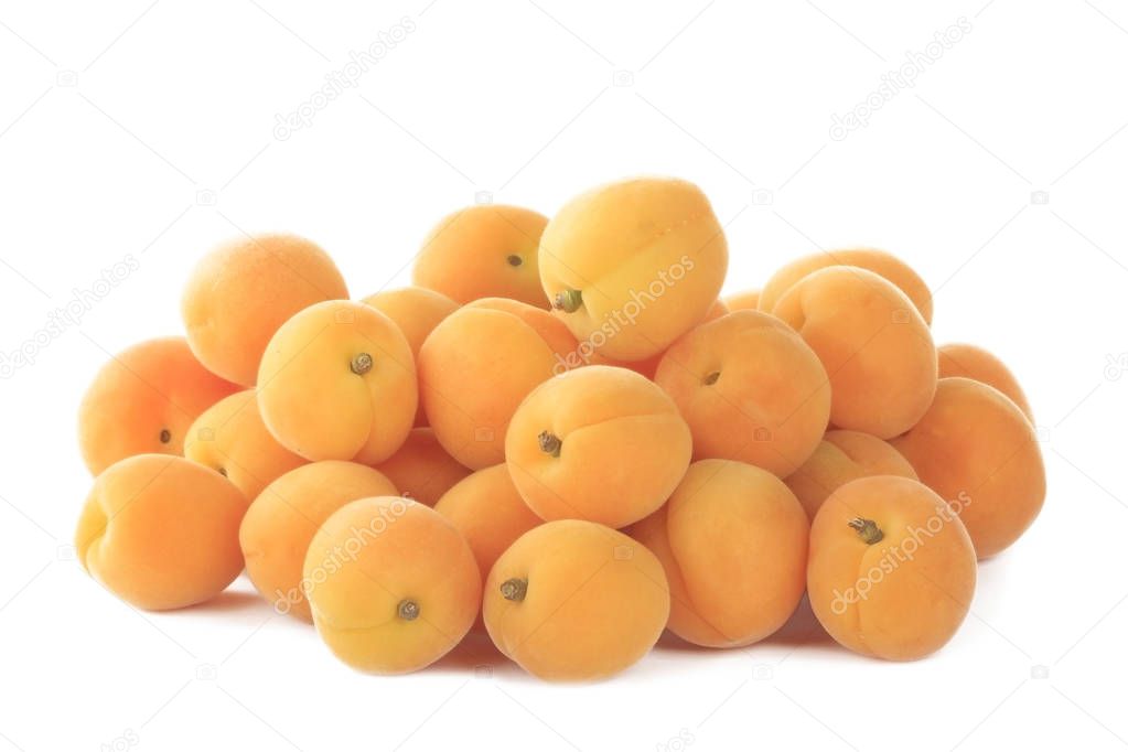 Heap of Ripe Apricots Isolated on White Background