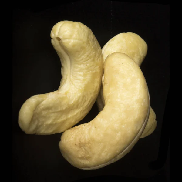 Cashew nuts on black background