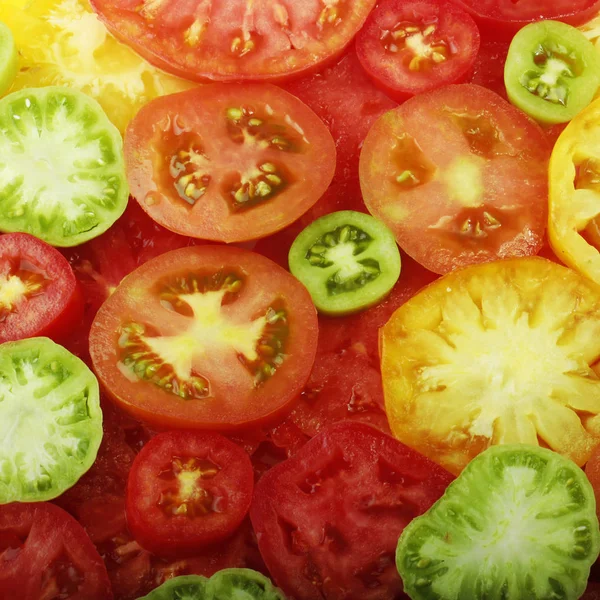 Closeup of tomatoes pattern, food background