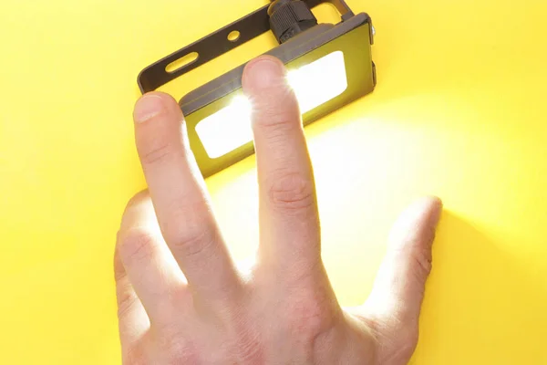 Luminous Diode Floodlight Holds Male Hand Lighting Device Modern Energy — Stock Photo, Image