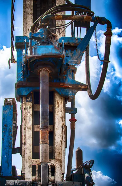 Drilling rig. Drilling deep wells in the bowels of the earth. Industry and construction. Mineral exploration - oil, gas and other resources.