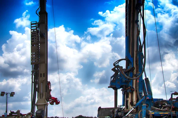 Drilling rig. Drilling deep wells in the bowels of the earth. Industry and construction. Mineral exploration - oil, gas and other resources.