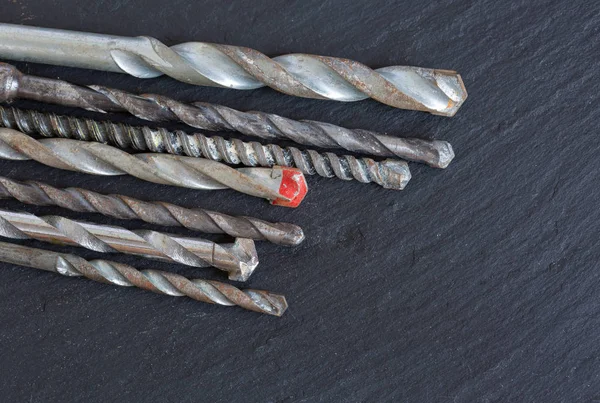 Various Old Masonry Drill Bits Slate Royalty Free Stock Photos