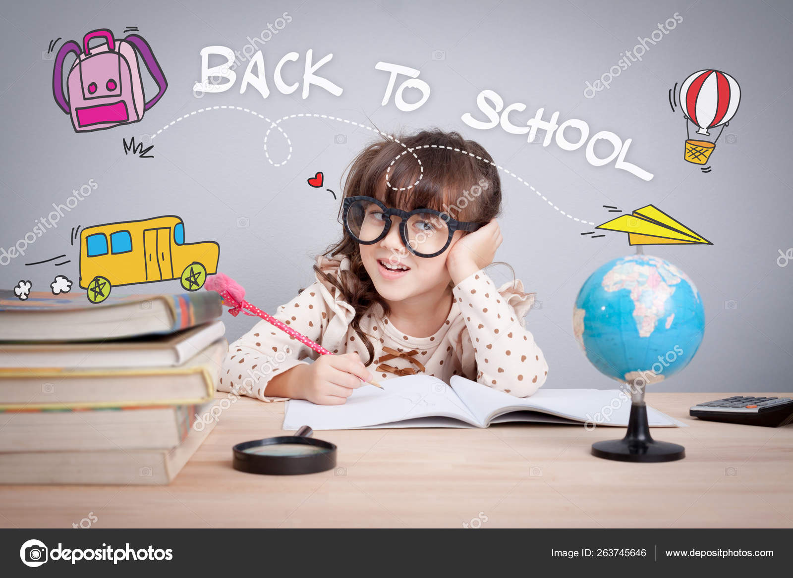 Back To School Concept Cute Little Girl Wear Glasses Do Homework At Home With Word Back To School And Cute Cartoon On Head Learning Teaching And Education Educate Children Stock Photo
