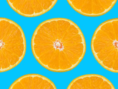 Mavi arka plan, pop art tarzı turuncu dilimler desen