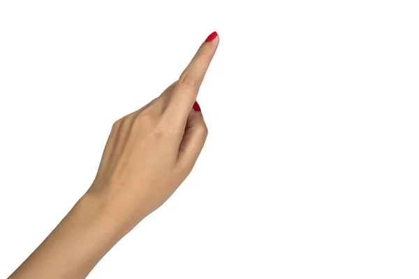 Rasing mão feminina com unhas vermelhas tocando ou apontando para algo isolado no fundo branco . — Fotografia de Stock