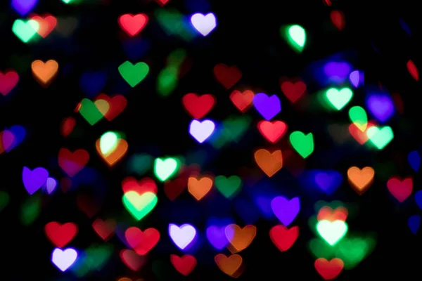 Kleurrijke hart bokeh achtergrond. Aftelkalender voor Valentijnsdag achtergrond — Stockfoto