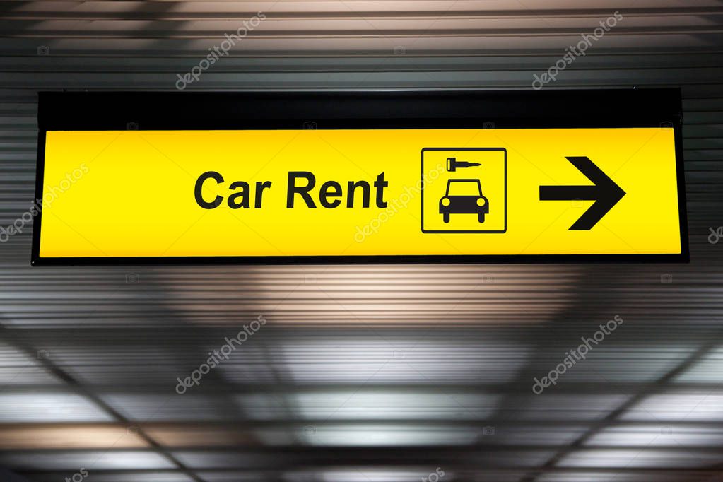 Sign with arrow point to rent a car service at the airport for passenger who want to hide a car for travel around city. freedom transportation for convenient travel