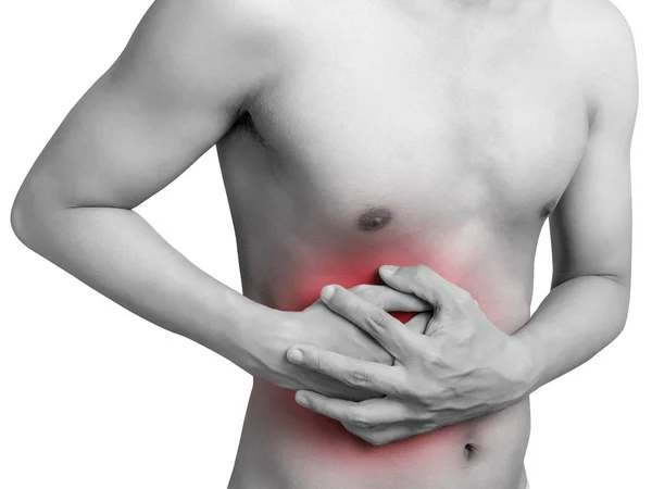 胃痛や胃腸科医に苦しむ男性の胃。ヘルスケアと医療のコンセプト。赤い色の痛み。白い背景に分離する — ストック写真