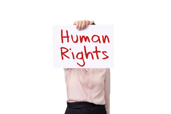 Mulher segurando papel cartão com mensagem DIREITOS HUMANOS isolados em fundo branco, conceito de direitos humanos — Fotografia de Stock