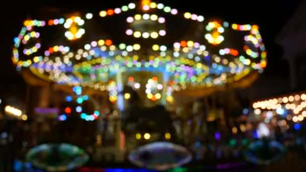 Abstract Blur Children Merry Carousel Night Bokeh Light Festival Background — Stock Video