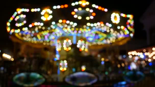 Absztrakt Blur Gyermekek Merry Körhinta Éjjel Bokeh Fény Fesztivál Háttér — Stock videók