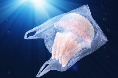 okyanus çevresel sorun kavramı plastik kirliliği. denizanası okyanus yüzen plastik torba içinde yüzme 
